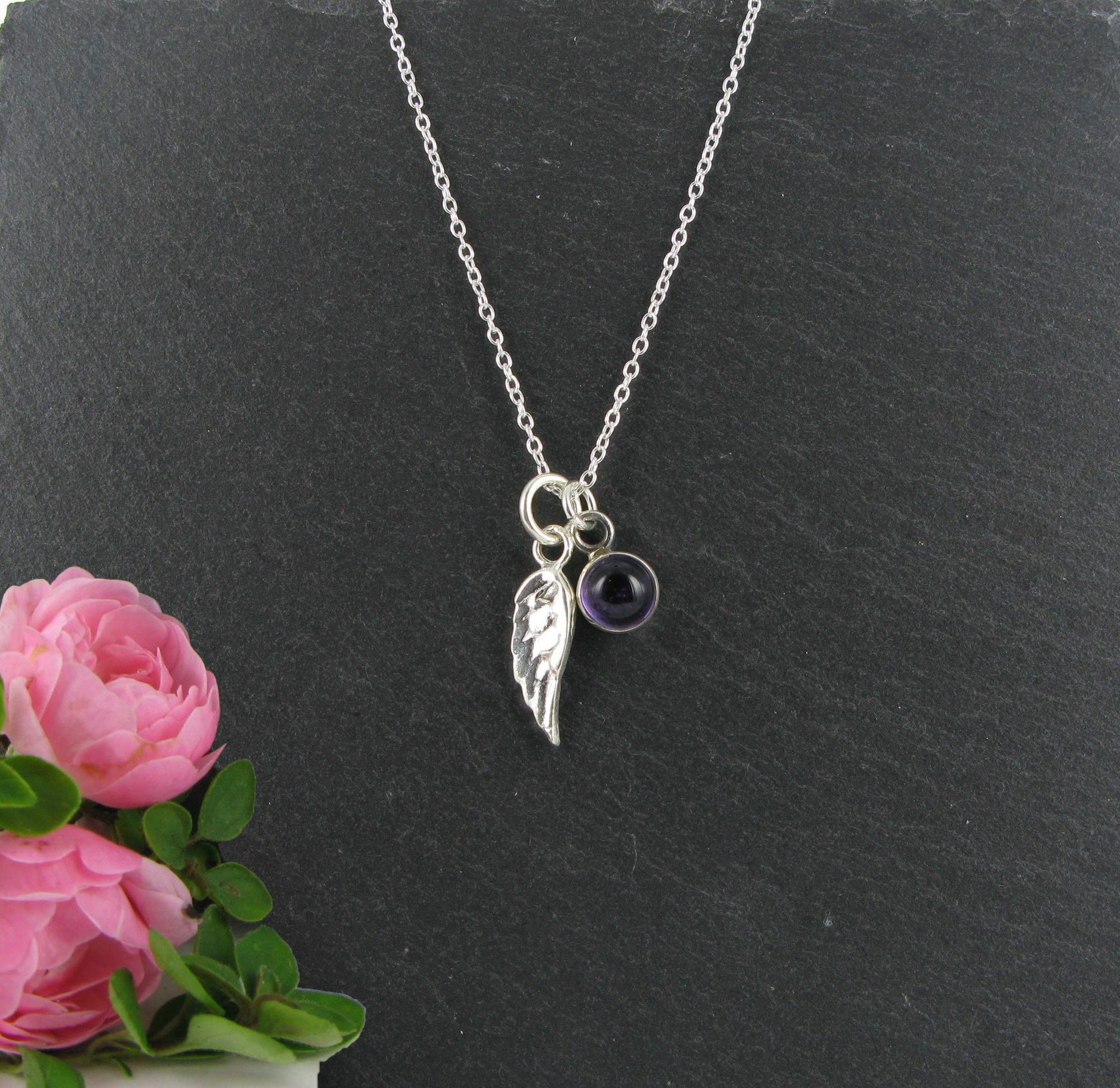 Silver best sale wing necklace